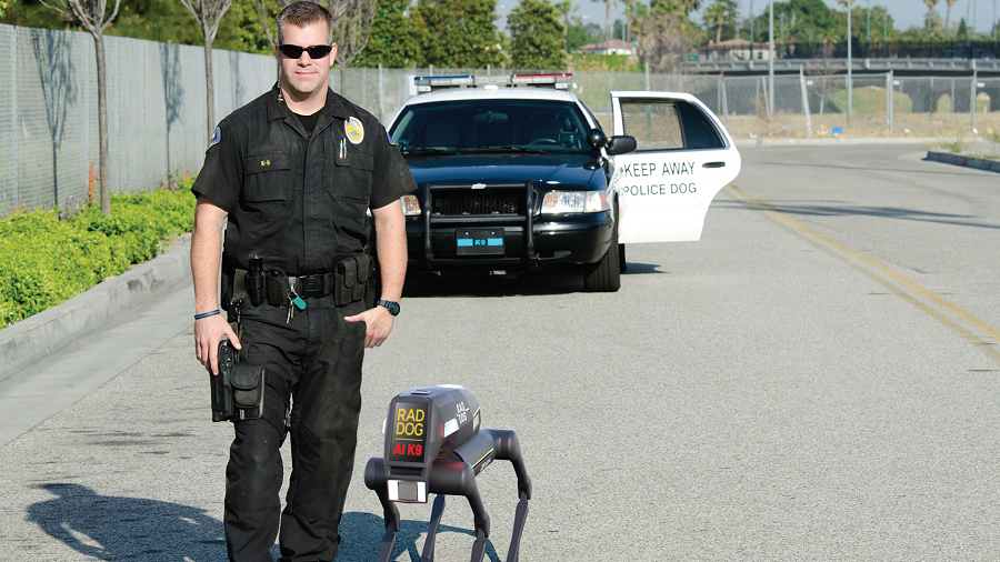raddog with police officer 900x506 1